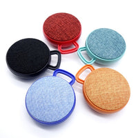 A01L Runder tragbarer Mini-Bluetooth-Lautsprecher mit Stoffstruktur, unterstützt Freisprechanrufe und TF-Karte, A01L Black, A01L Orange, A01L Green, A01L Blue, A01L Red